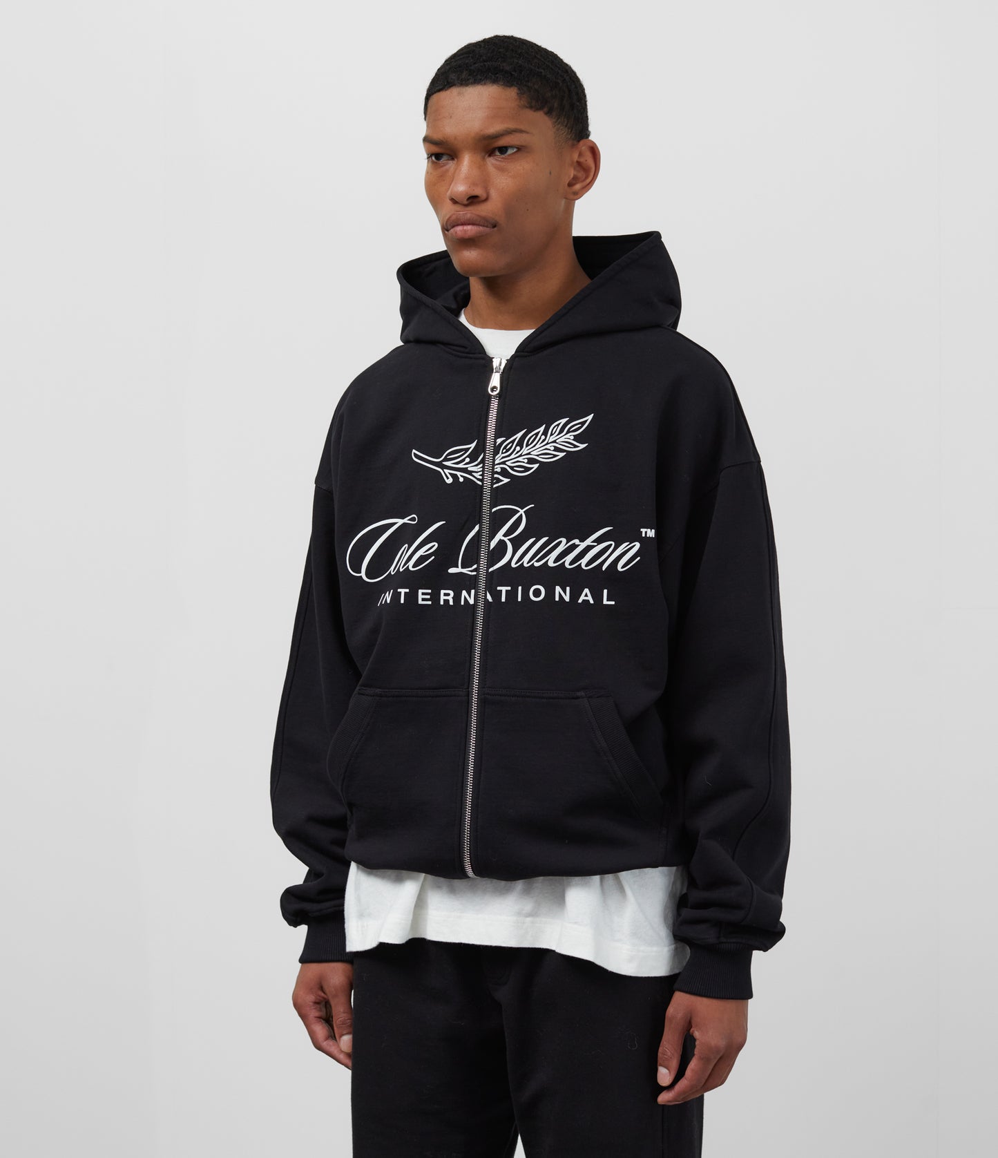 INTERNATIONAL ZIPPED HOODIE