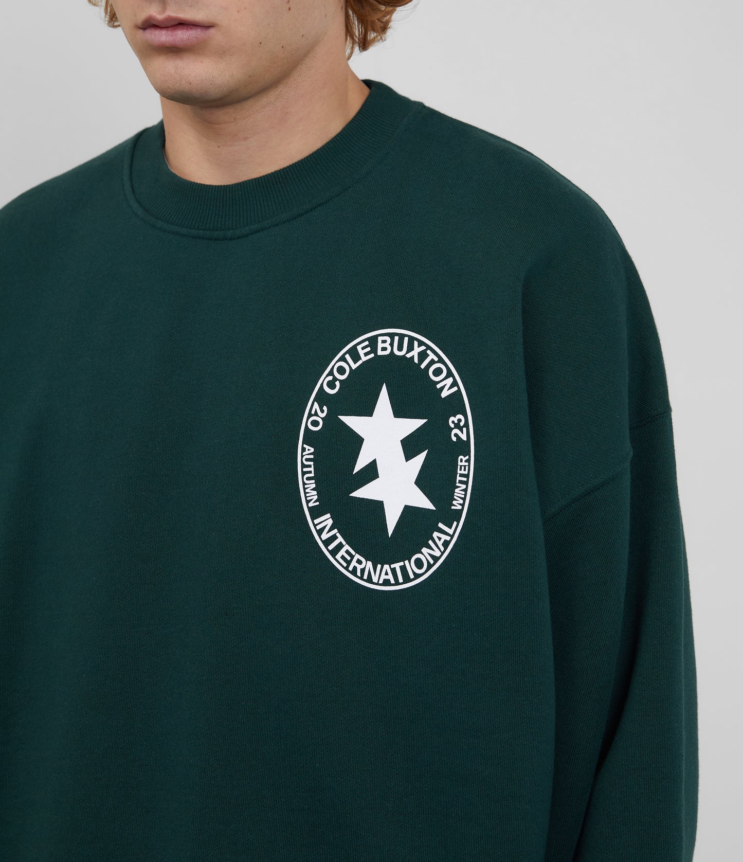 CB INTERNATIONAL CREST SWEATSHIRT