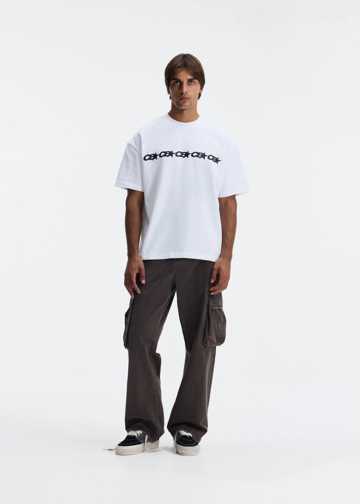 A white short-sleeve crewneck t-shirt featuring a black 'CEK' brand logo printed across the chest, displayed on a clean white background.