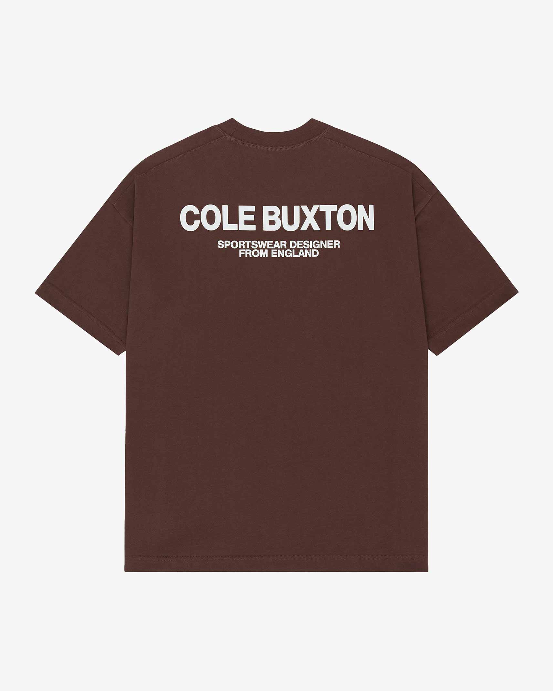 Brown t-shirt with 'Cole Buxton' text on the back against a white background