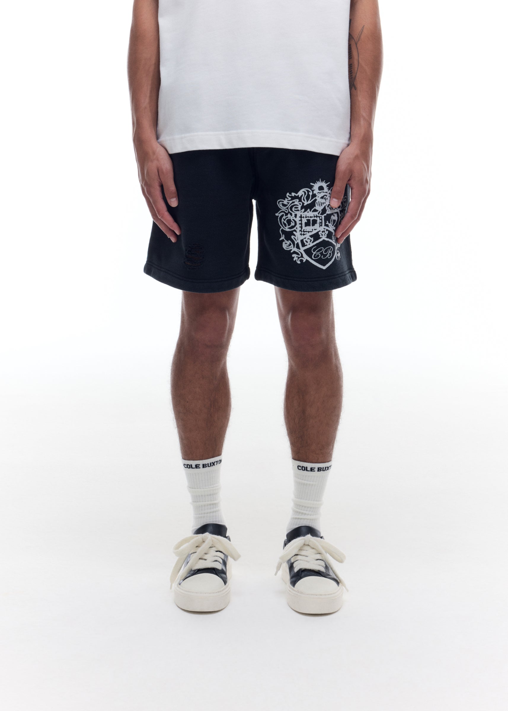 DISTRESSED COLLEGIATE CREST SHORTS
