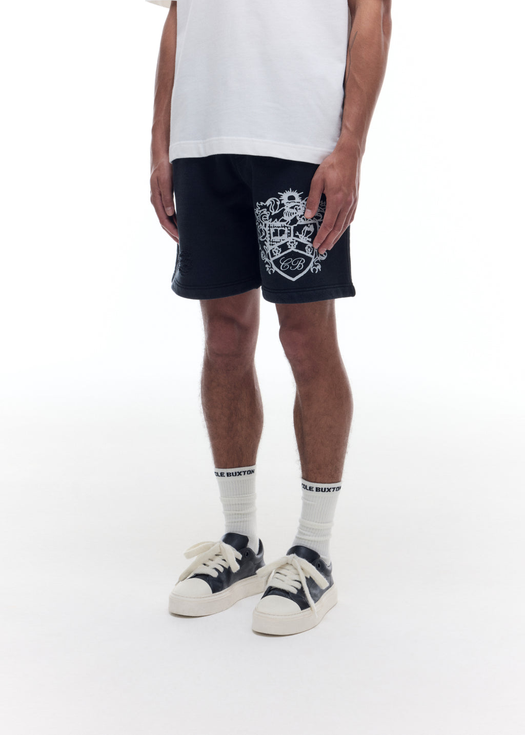 DISTRESSED COLLEGIATE CREST SHORTS