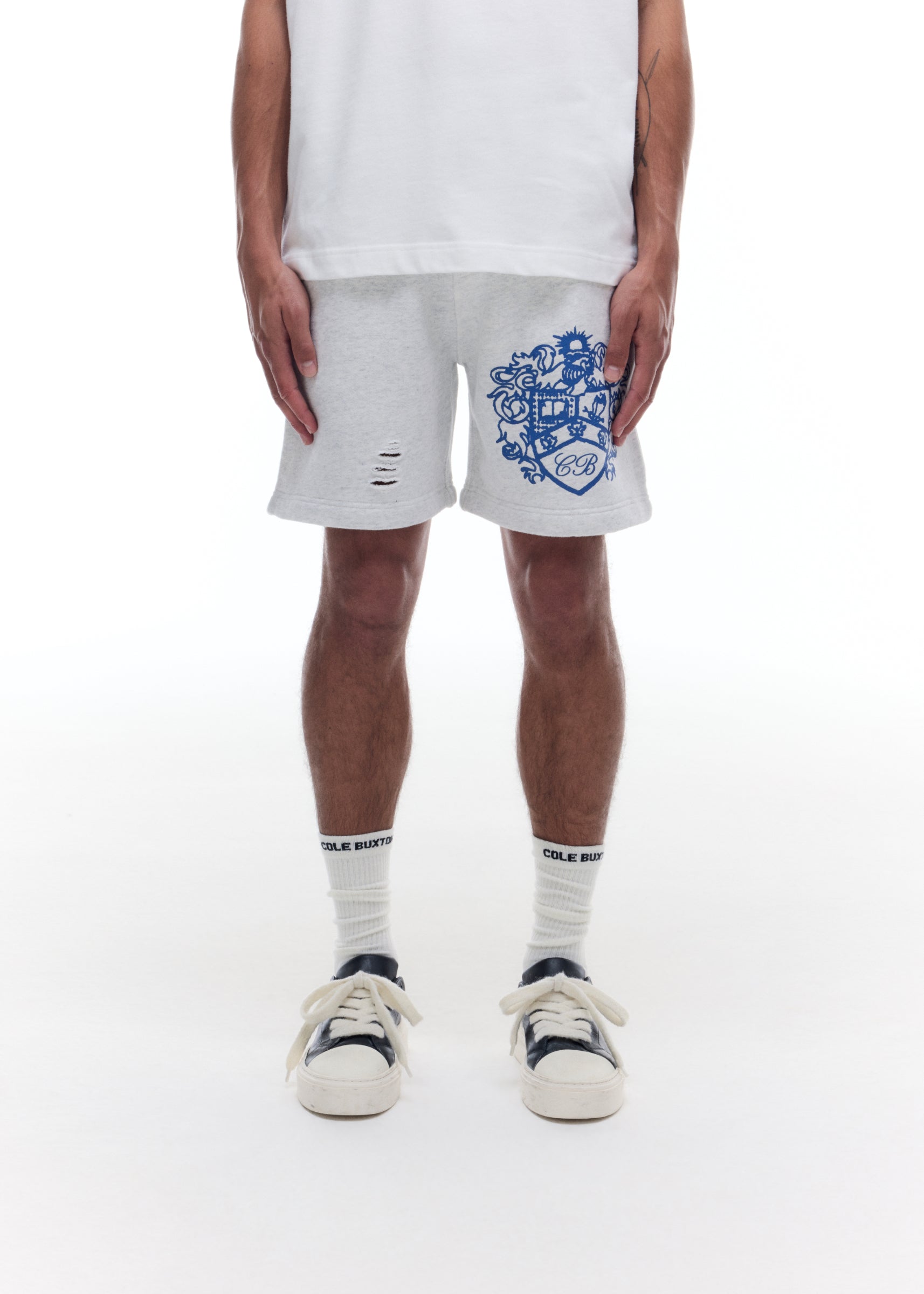 DISTRESSED COLLEGIATE CREST SHORTS