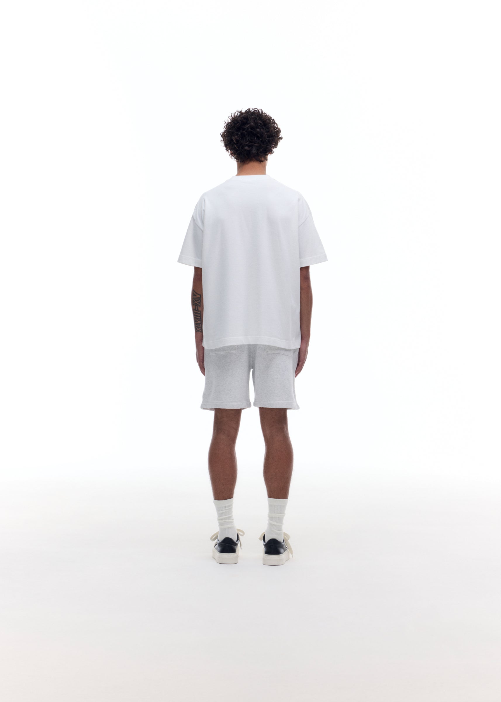 DISTRESSED COLLEGIATE CREST SHORTS