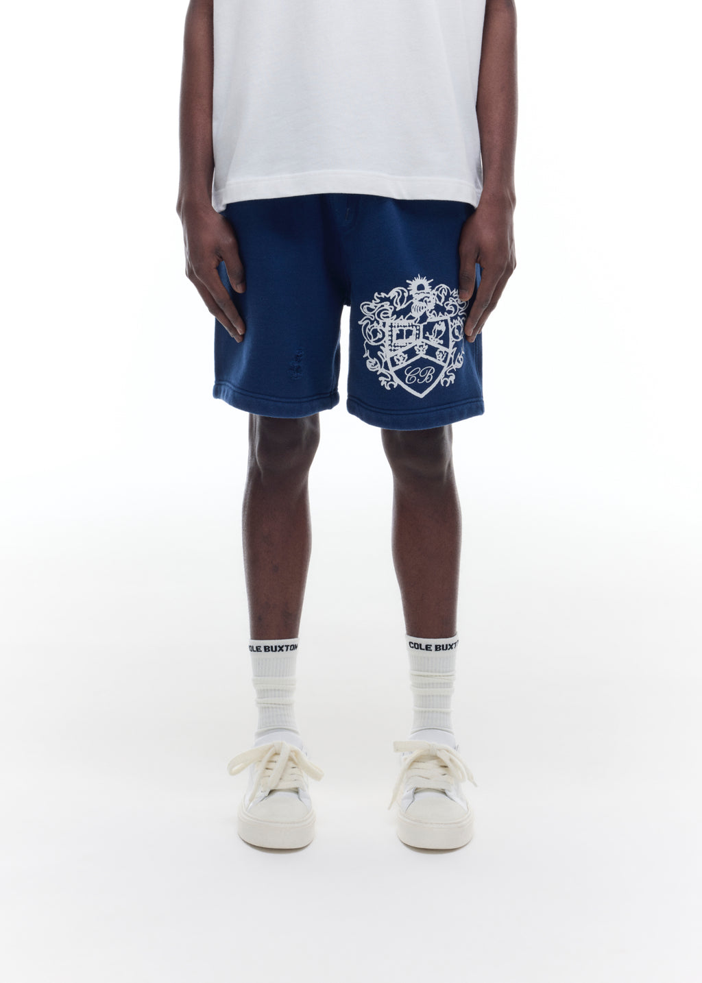 DISTRESSED COLLEGIATE CREST SHORTS