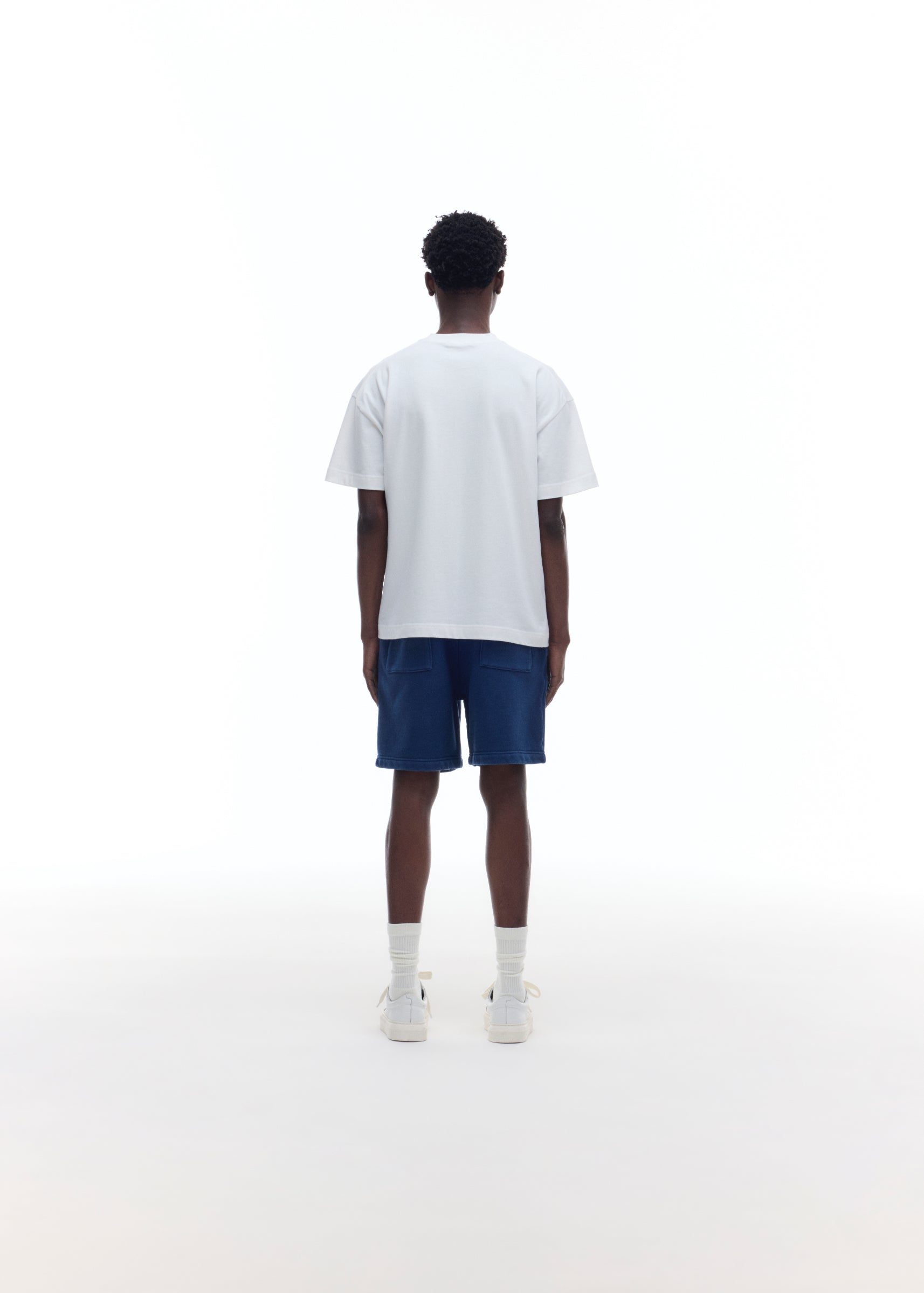 DISTRESSED COLLEGIATE CREST SHORTS