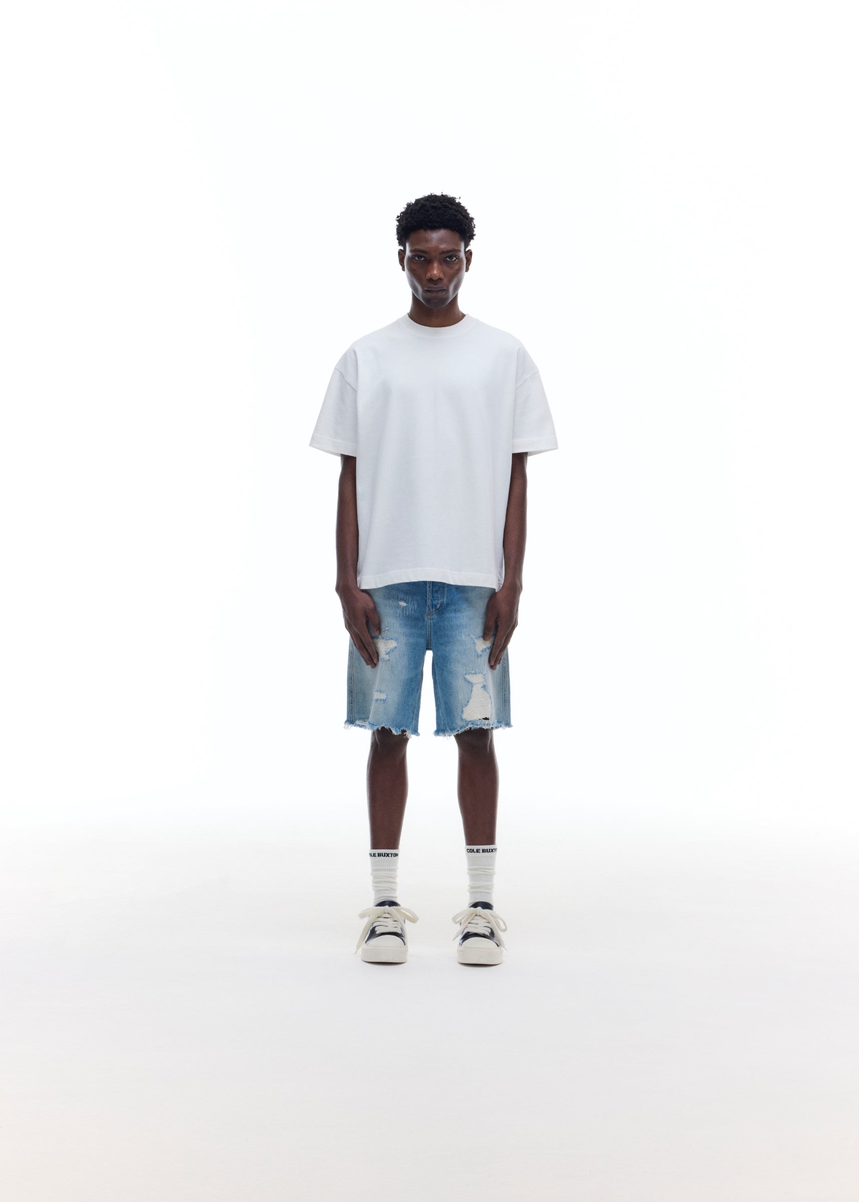 REPAIRED DENIM SHORTS