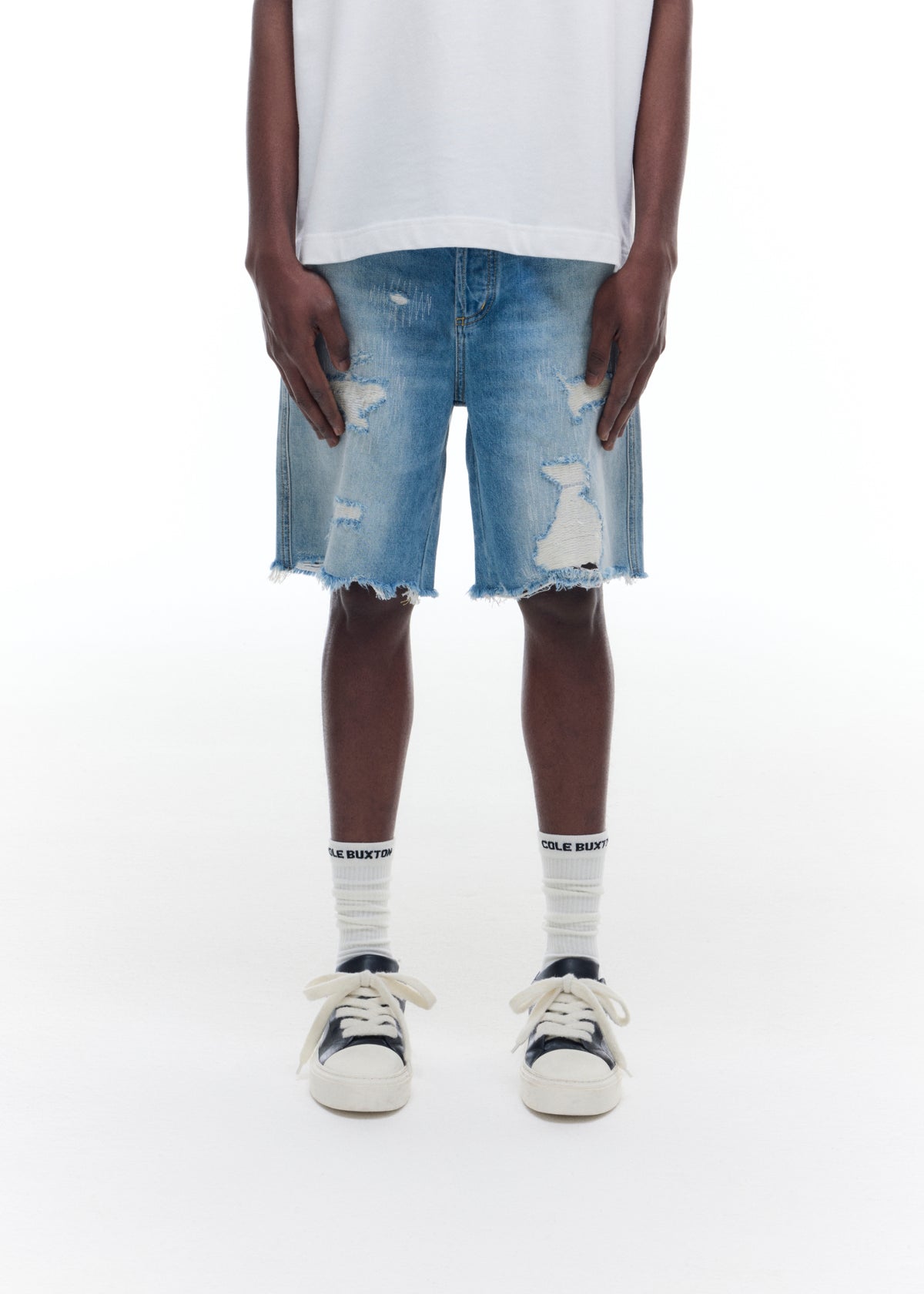 REPAIRED DENIM SHORTS