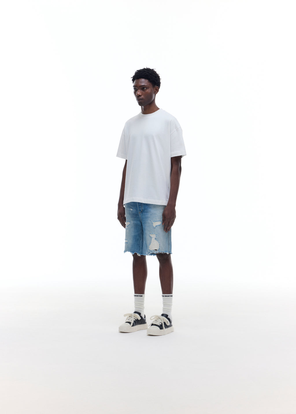 REPAIRED DENIM SHORTS