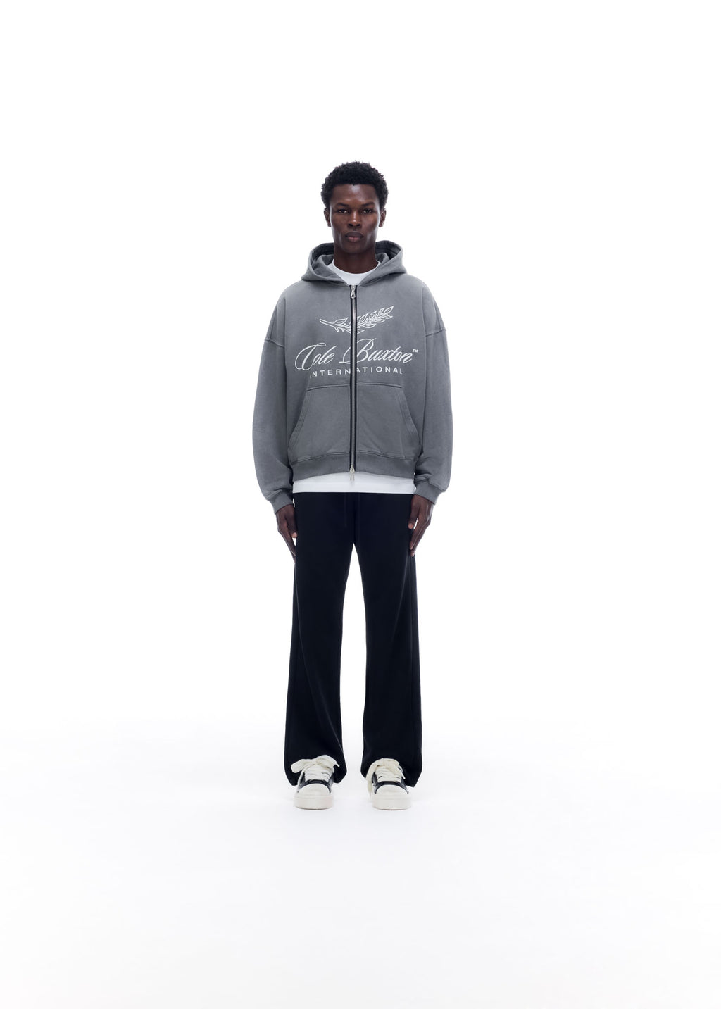 INTERNATIONAL ZIPPED HOODIE